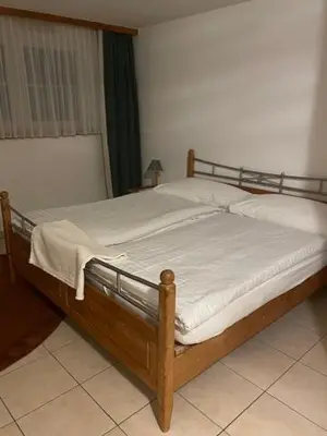 Ein Bett oder Betten in einem Zimmer der Unterkunft Haus Alpenschloss