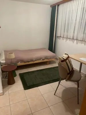 Ein Bett oder Betten in einem Zimmer der Unterkunft Haus Alpenschloss