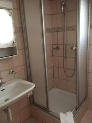 Ein Badezimmer in der Unterkunft Haus Alpenschloss