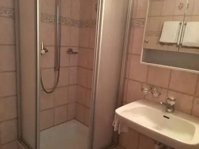 Ein Badezimmer in der Unterkunft Haus Alpenschloss