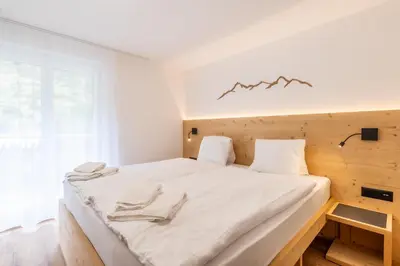 Ein Bett oder Betten in einem Zimmer der Unterkunft Alpin apartment Brachji - bei der Bergbahn
