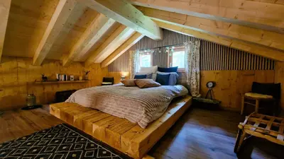 Ein Bett oder Betten in einem Zimmer der Unterkunft Mayen Praz dau Lauc Charme et nature 4 personnes