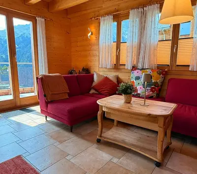 Ein Sitzbereich in der Unterkunft Chalet Poiema