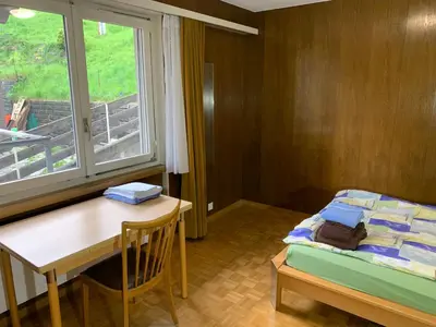Ein Bett oder Betten in einem Zimmer der Unterkunft Ausgangspunkt zu Zermatt