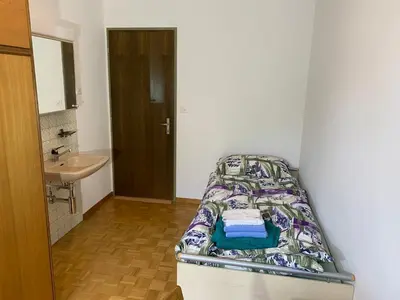 Ein Bett oder Betten in einem Zimmer der Unterkunft Ausgangspunkt zu Zermatt