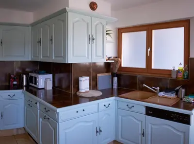 Küche/Küchenzeile in der Unterkunft Chalet à thème, 2 chambres, vue sur les montagnes