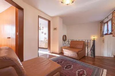 Ein Bett oder Betten in einem Zimmer der Unterkunft Duplexwohnung in den Alpen