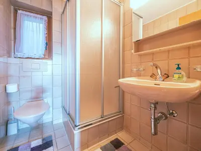 Ein Badezimmer in der Unterkunft Duplexwohnung in den Alpen