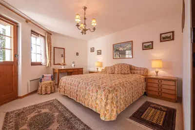 Ein Bett oder Betten in einem Zimmer der Unterkunft Duplexwohnung in den Alpen