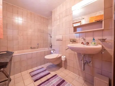 Ein Badezimmer in der Unterkunft Duplexwohnung in den Alpen