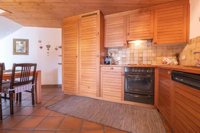 Küche/Küchenzeile in der Unterkunft Duplexwohnung in den Alpen