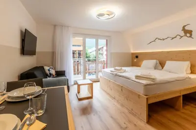 Ein Bett oder Betten in einem Zimmer der Unterkunft Exclusives Studio bei der Bergbahn by Inspiringplaces Zermatt
