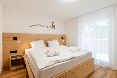 Ein Bett oder Betten in einem Zimmer der Unterkunft Modernes und schickes Apartment bei der Bergbahn by Inspiringplaces Zermatt