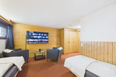 Ein Bett oder Betten in einem Zimmer der Unterkunft Central suite to stay for 2 experience Saas-Fee
