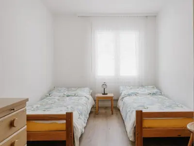 Ein Bett oder Betten in einem Zimmer der Unterkunft Apartment Casa Yolanda 2- OG Süd by Interhome