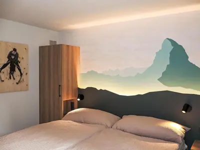 Ein Bett oder Betten in einem Zimmer der Unterkunft Apartment Juliana-1 by Interhome
