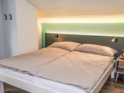 Ein Bett oder Betten in einem Zimmer der Unterkunft Apartment Juliana-2 by Interhome
