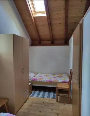 Ein Bett oder Betten in einem Zimmer der Unterkunft Eline sotto ai piazz 12 Casa Elin