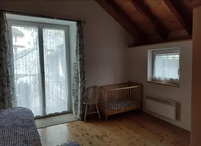 Ein Bett oder Betten in einem Zimmer der Unterkunft Eline sotto ai piazz 12 Casa Elin