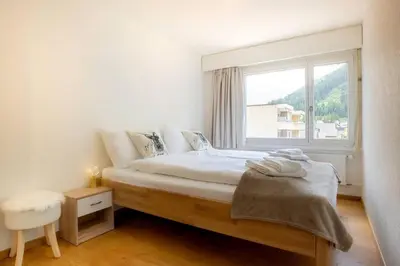 Ein Bett oder Betten in einem Zimmer der Unterkunft Casa Olympia
