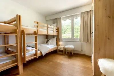 Ein Bett oder Betten in einem Zimmer der Unterkunft Casa Olympia