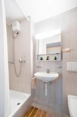 Ein Badezimmer in der Unterkunft Alpenheim Apartment