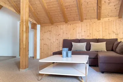 Ein Sitzbereich in der Unterkunft Chalet Gemsstock and Little Gemsstock, whole house