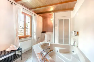 Ein Badezimmer in der Unterkunft Chalet Gemsstock