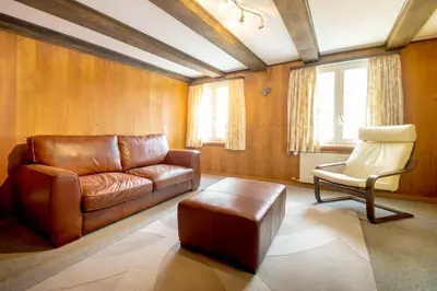 Ein Sitzbereich in der Unterkunft HOSPENTAL Chalet