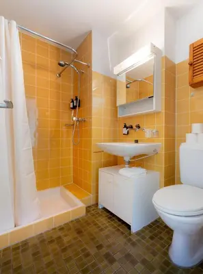 Ein Badezimmer in der Unterkunft AnDerBlick Apartment