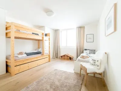 Ein Bett oder Betten in einem Zimmer der Unterkunft Alpine Chic Apartment