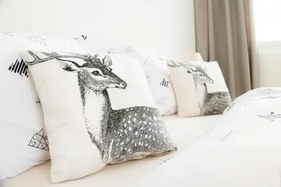 Ein Bett oder Betten in einem Zimmer der Unterkunft Alpine Chic Apartment