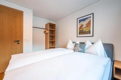 Ein Bett oder Betten in einem Zimmer der Unterkunft Haus Eratic
