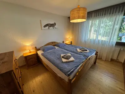 Ein Bett oder Betten in einem Zimmer der Unterkunft Terrasse des Alpes 2005