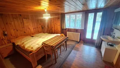 Ein Bett oder Betten in einem Zimmer der Unterkunft FREE Bus Winter Haus Ramona