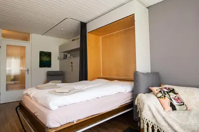 Ein Bett oder Betten in einem Zimmer der Unterkunft Studio Harmony