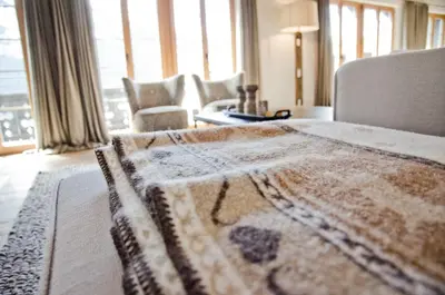 Ein Bett oder Betten in einem Zimmer der Unterkunft Apartment Fortuna 5.5 - GriwaRent AG