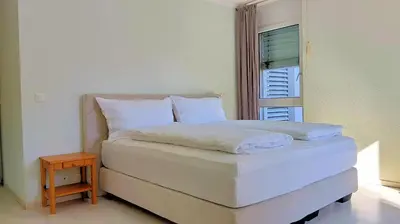 Ein Bett oder Betten in einem Zimmer der Unterkunft Residence la Rochelle