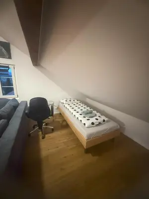 Ein Sitzbereich in der Unterkunft Ferienwohnung Winterzeit near Interlaken Thun Spiez Kandersteg