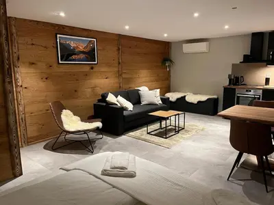 Ein Sitzbereich in der Unterkunft Mountain Homes -Base Camp Studio