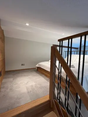 Ein Bett oder Betten in einem Zimmer der Unterkunft Mountain Homes - Summit Studio