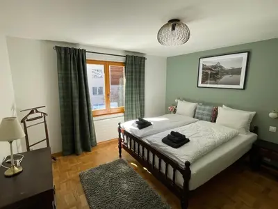 Ein Bett oder Betten in einem Zimmer der Unterkunft Apartment Forest- finest selections by Inspiringplaces Zermatt