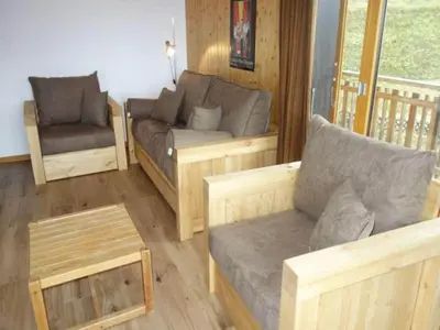 Ein Sitzbereich in der Unterkunft Luxury apartment in Veysonnaz