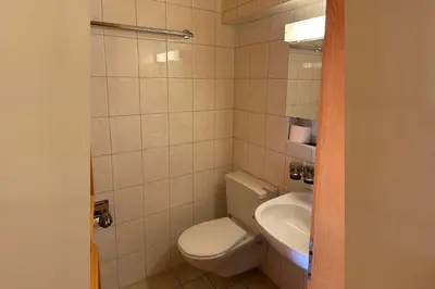 Ein Badezimmer in der Unterkunft Chalet Val Roc - Dachwohnung West