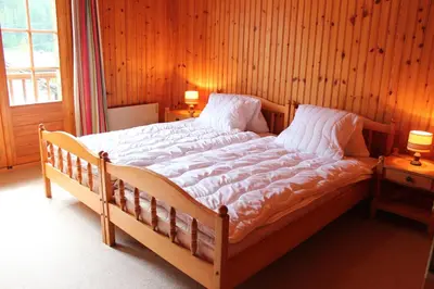 Ein Bett oder Betten in einem Zimmer der Unterkunft Chalet Chapon Joly 8 personnes