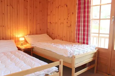 Ein Bett oder Betten in einem Zimmer der Unterkunft Chalet Chapon Joly 8 personnes