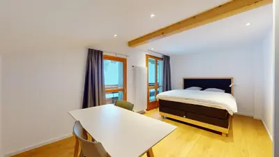 Ein Bett oder Betten in einem Zimmer der Unterkunft Chalet de l'Ours AUTHENTIC Appart Chambésy 6 pers