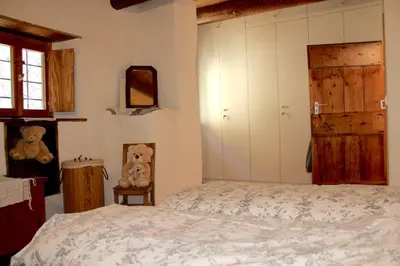 Ein Bett oder Betten in einem Zimmer der Unterkunft Casa Meridiana - Sonlerto - Val Bavona