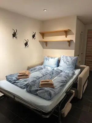 Ein Bett oder Betten in einem Zimmer der Unterkunft Matterhornview Viktoria B