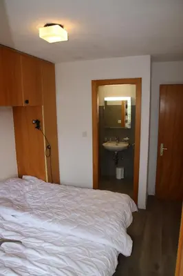 Ein Bett oder Betten in einem Zimmer der Unterkunft Mélèzes R 020 - NEXT TO THE SLOPES apartment 8 pers